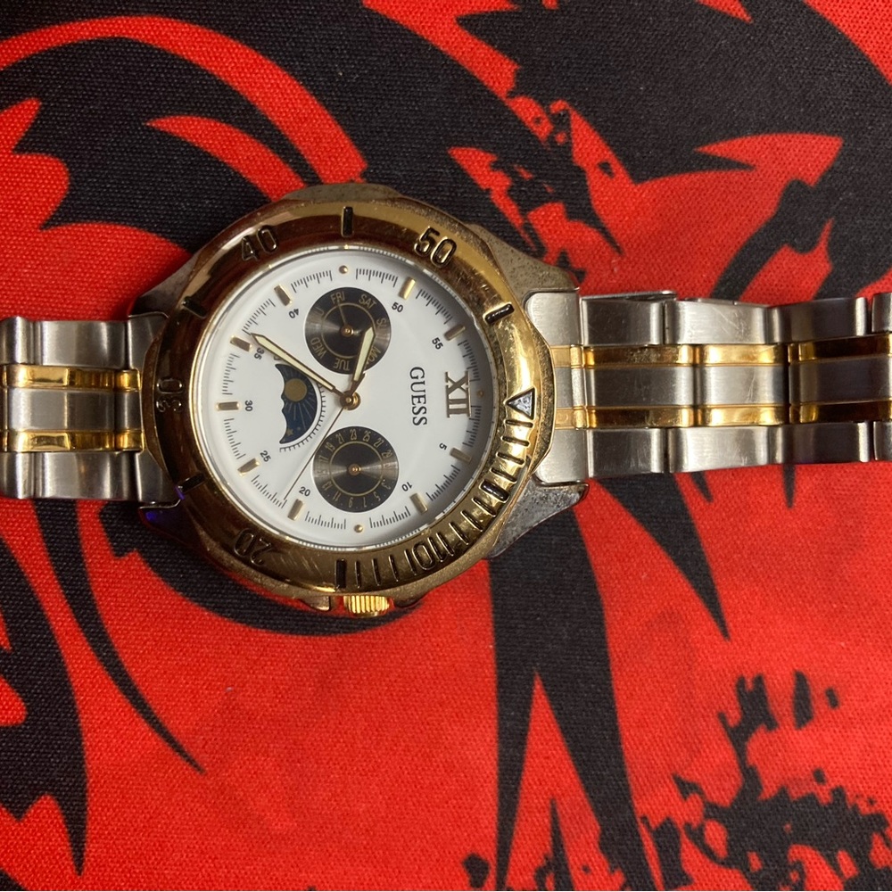 GUESS STAINLESS STEEL GOLD TONE ACCENTS